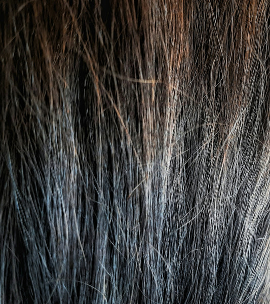 a close up of a woman's hair