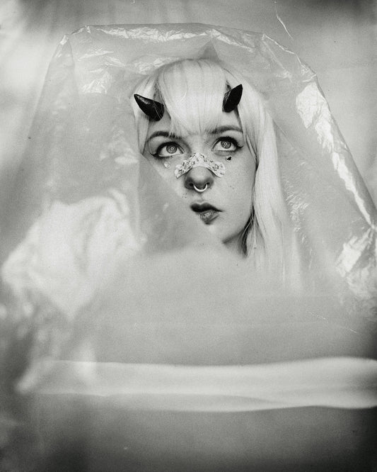 a woman's face in a bubble