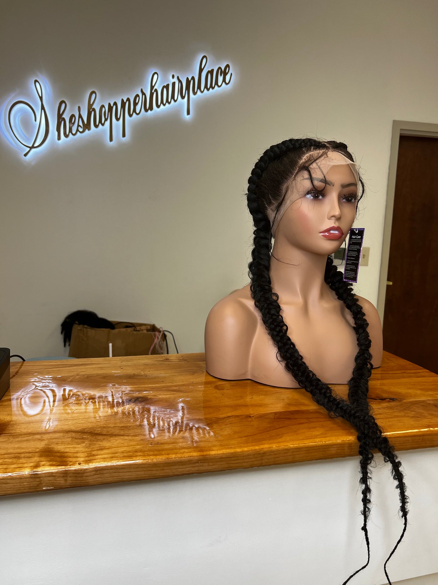 Two butterfly braids to the back