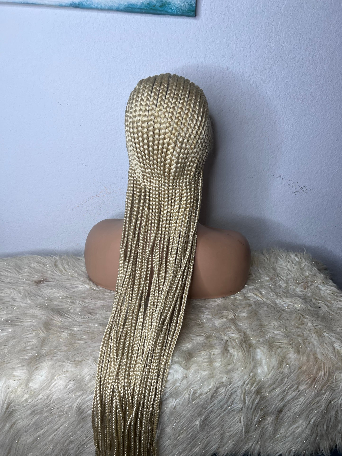 Blonde braids to the back